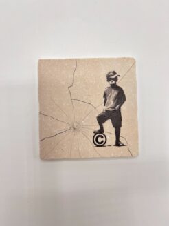 Tuile de Banksy « Copyright Rebel »
